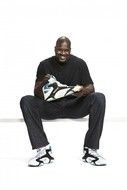 dark skin man with Reebok Shaq sneakers