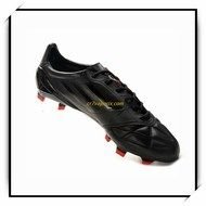 black soccer shoes on a white background