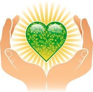 green heart in the hands of man