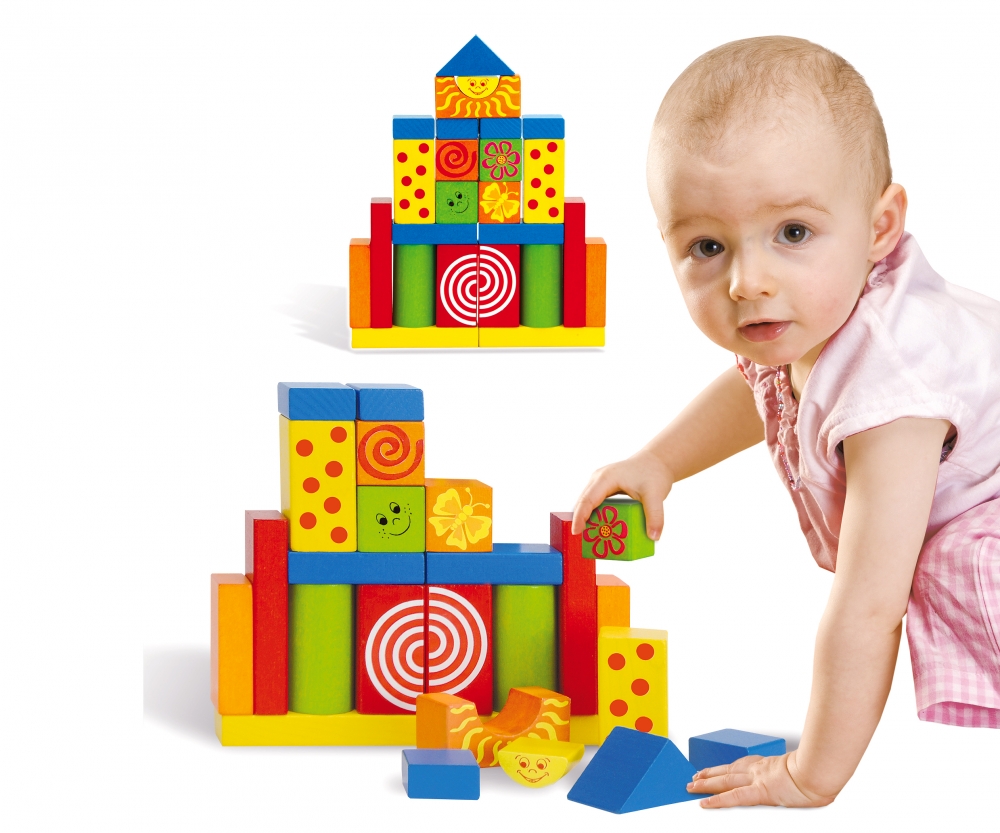 Child with multi-colored children's blocks free image download