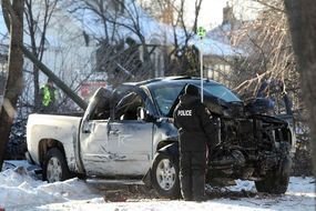 Winnipeg Police Officers Survey The Scene Of A Single Vehicle Accident