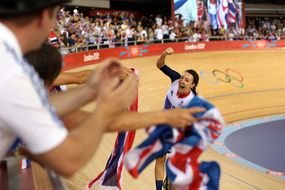 London 2012 Olympics games, happy woman on track, cycling winner