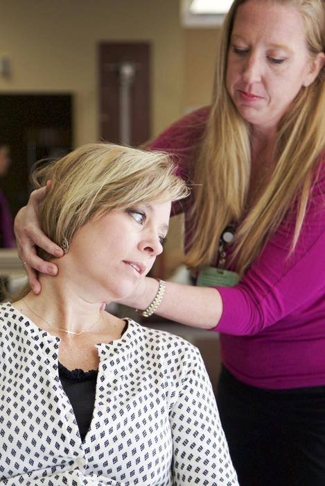 massage of neck, two women indoor