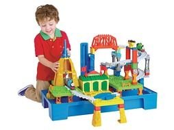 boy plays with toys