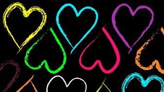 multi-colored hearts on black wallpaper