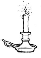 black and white picture of a burning candle on a stand