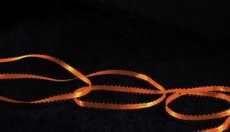 Ribbon On Fire at darkness, background