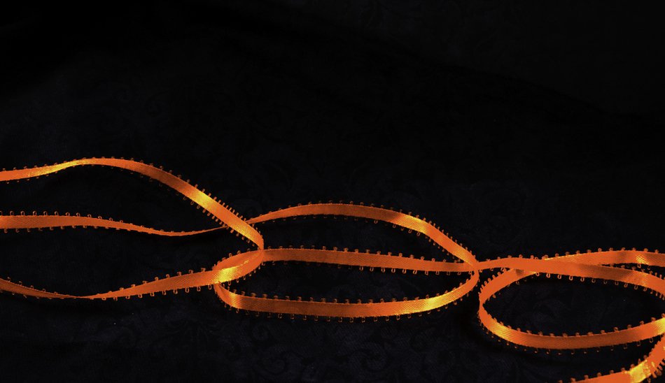 Ribbon On Fire at darkness, background