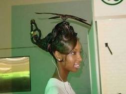 photo of a dark-skinned girl with a helicopter haircut