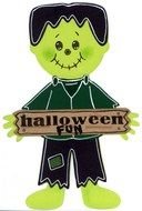 green monster holding a halloween sign