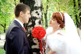 Wedding couple near the birch