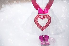 girl taking bag in the shape of heart