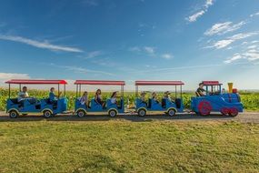 children's steam train rides through the corn field