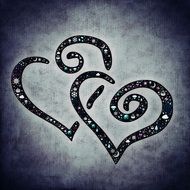 two hearts on a grey background