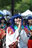 japanese girl with blue hair laughs