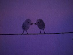 Violet birds made by making the thumbprints