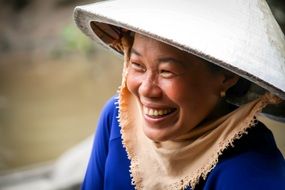 Vietnamese girl in national hat