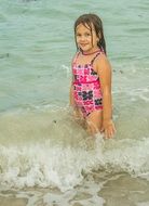 Girl is swimming in the ocean