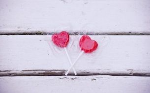 Sweets to the day of the holy valentine on the background of boards