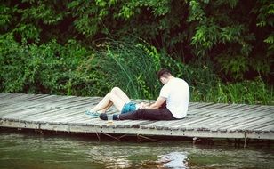 happy couple by the river