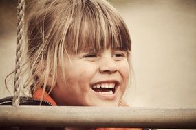 Lauthing girl face blond retro photo