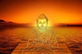 painted buddha statue on the background of the golden sea