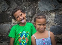 funny girls malasian stone wall view