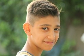 cute young iraqi boy portrait outdoor