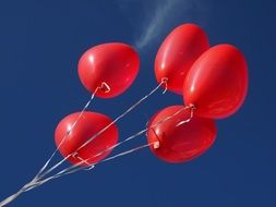 red balloons are a symbol of love