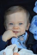 pretty baby boy with blue eyes