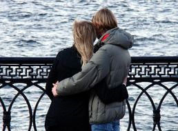 standing couple of lovers by the river