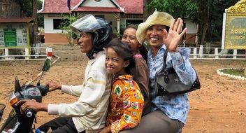 Picture of cambodian people are on a motorcycle