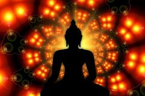 silhouette of buddha on an abstract background