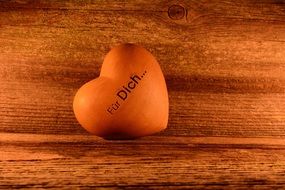 wooden heart on wooden board decoration