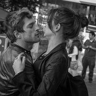 black and white photo of a couple in love dancing