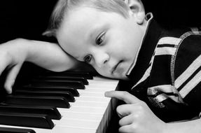 boy music piano