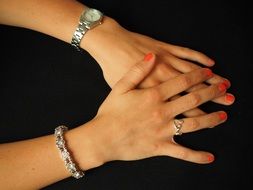 watches and jewelry on female hands