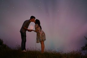 couple in love in pink twilight