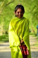 child student in the village on blurred background