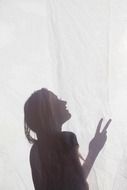 Silhouette of happy girl