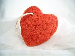 red heart-shaped washcloth