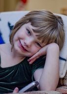 Portrait of young toothless girl