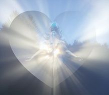 religious figure against the sky in the heart