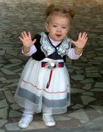 little girl in a beautiful lush dress