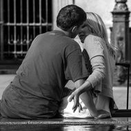 kiss of a couple in love in the city of love
