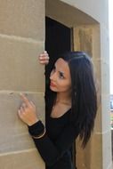 model posing by the door