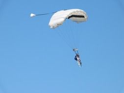 paratroopers in the clear sky