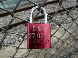 engraving on a padlock