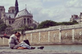 loving couple on the embankment in Paris