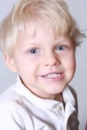 Young smiling blond child